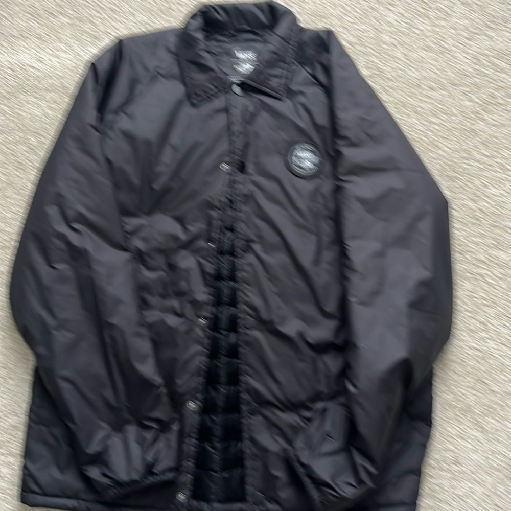 Men’s Vans/North Face Jacket.  Size medium, color black, poly filll